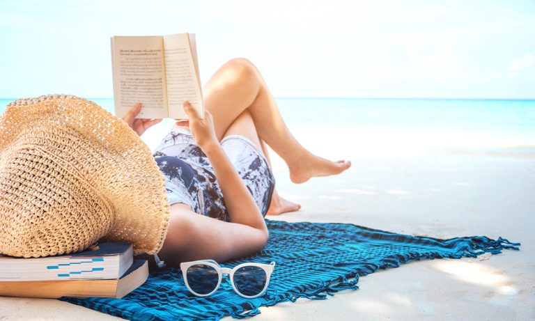 girl reading a book on the beach|||||||||